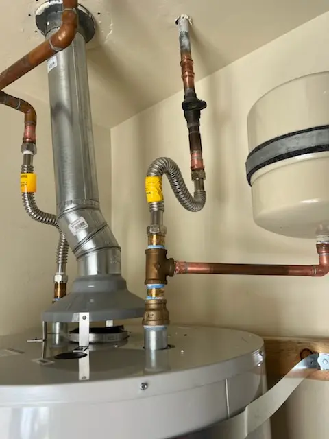 Water heater installation and plumbing repair in Purmela